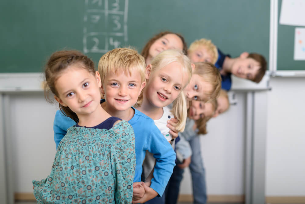 SDT: Line of students in classroom